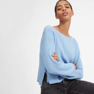 Woman in blue Everlane cashmere jumper: How to Create an Ethical Winter Wardrobe