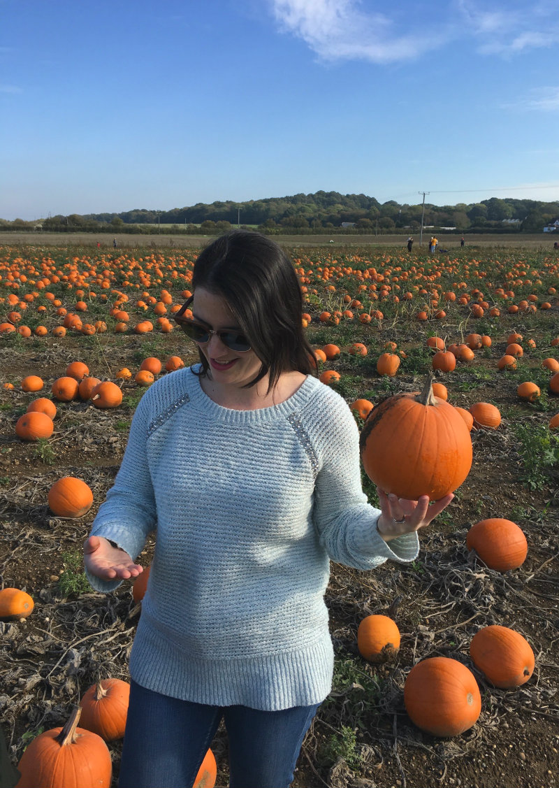 Elle holding a pumpkin: Pumpkin Picking in Kent