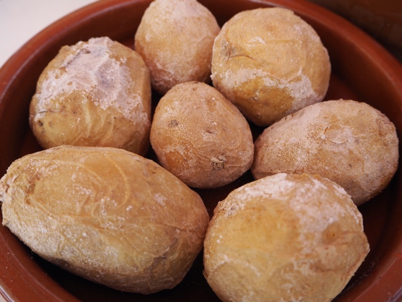 Papas arrugadas con mojo - a bowl of salty, steamed potatoes